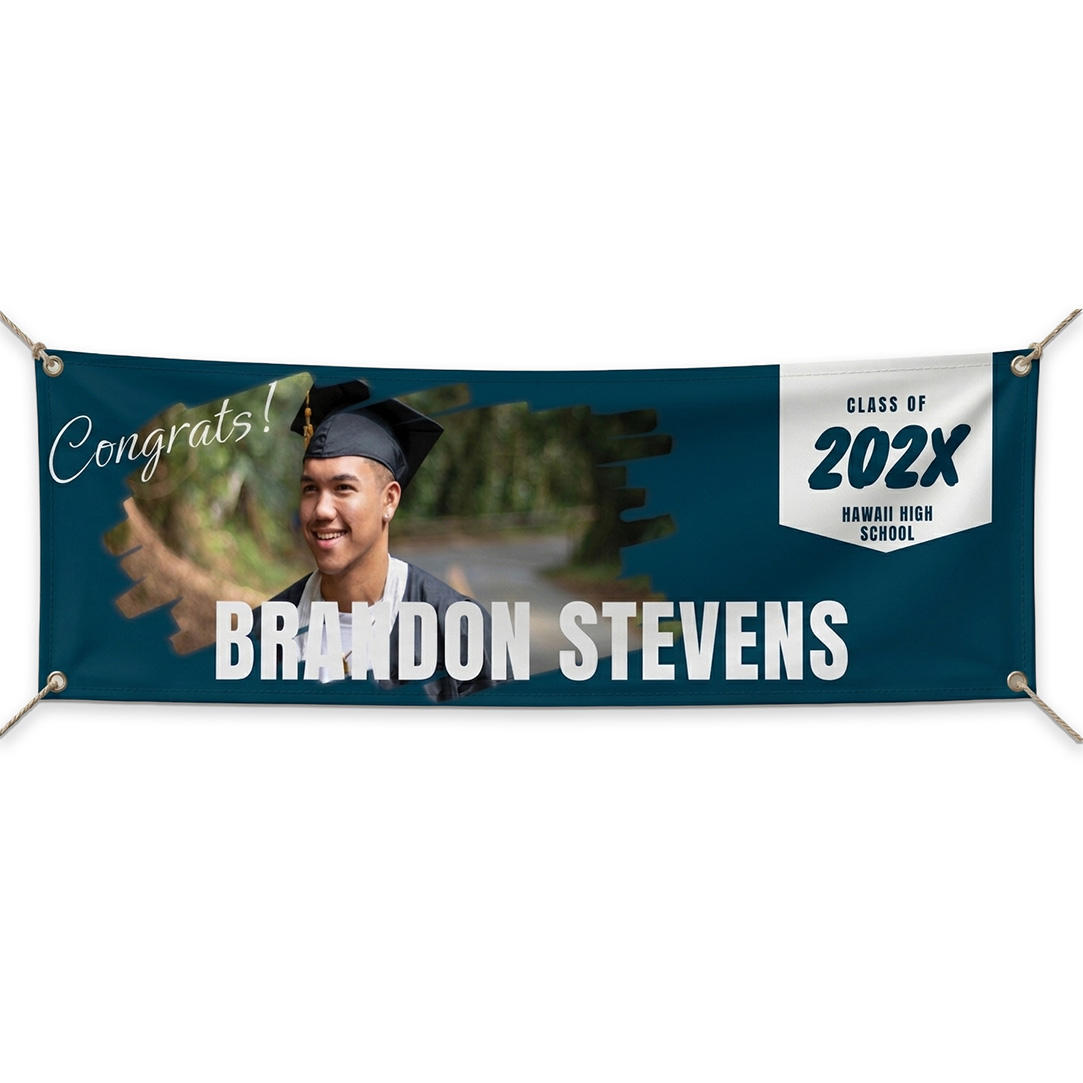 Bold portrait graduation vinyl banner featuring celebratory graphics and text, designed for graduation events.