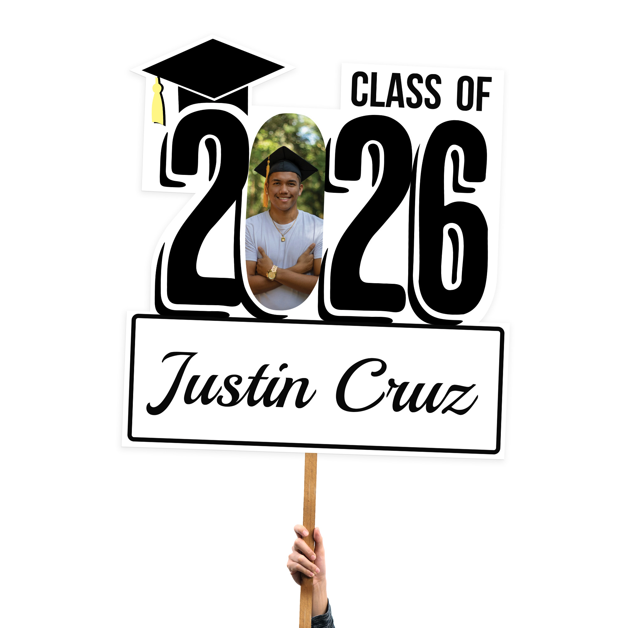 Graduation photo with large class of 2025 and cap cut out with hand held stick for display