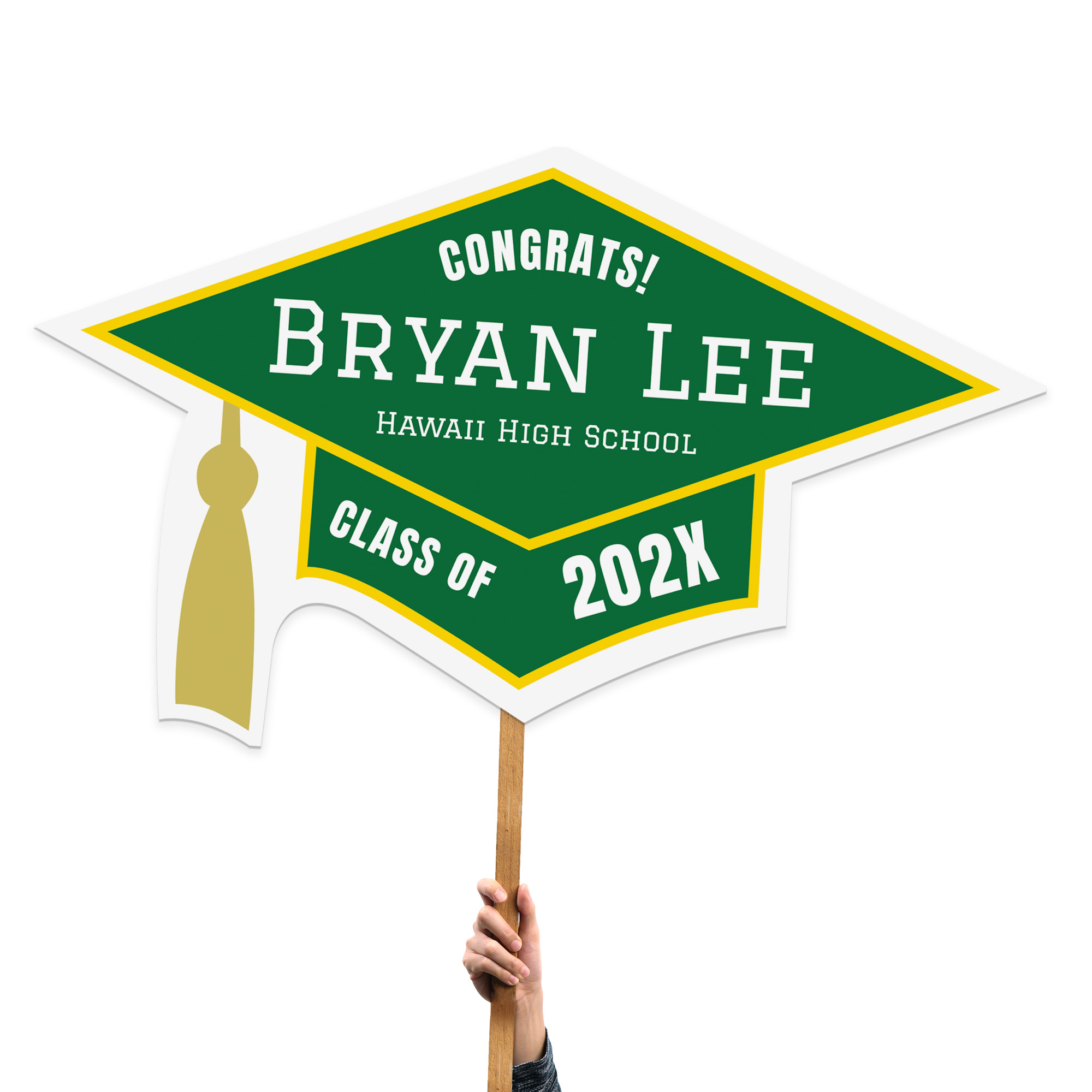 Green graduation cap shaped sign  with a tassel on the left side, featuring a printed name and school year