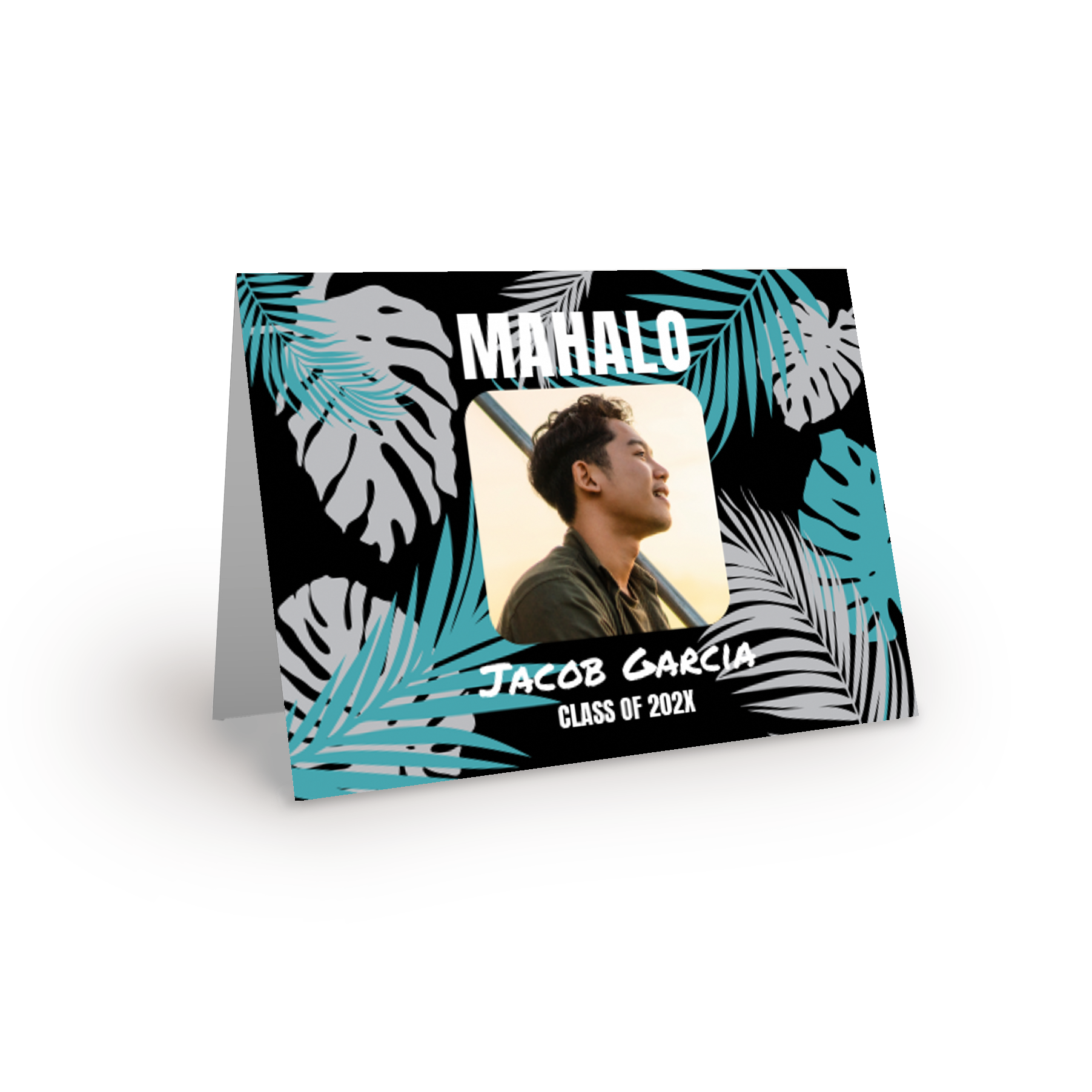 Tropical leaves adorn a graduation card made of linen paper, featuring a modern Mahalo design.